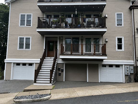 Third floor, tandem 2 car garage left of stairwell