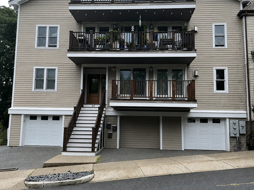 Third floor, tandem 2 car garage left of stairwell