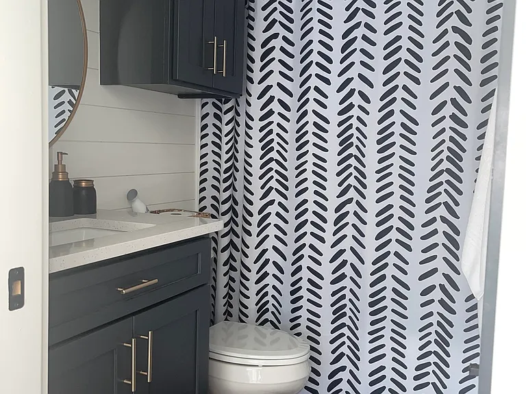 Full bathroom with tub shower