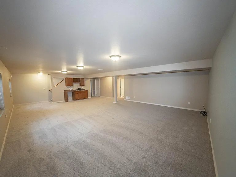 2nd BR just to the right of the wet-bar - next doorway is basement full bathroom - very big room here