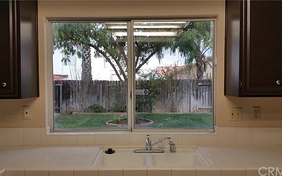 view of backyard from the kitchen