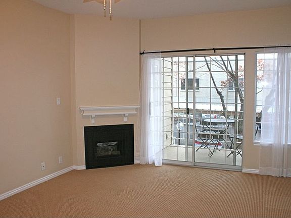 Gas fireplace. Slider leading to the balcony
