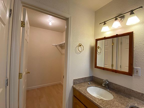 Walk-in closet connected to Master Bathroom