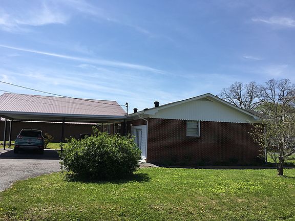 Hillcrest entrance to 1101 W Lincoln. Park on drive and take sidewalk to front entrance.
