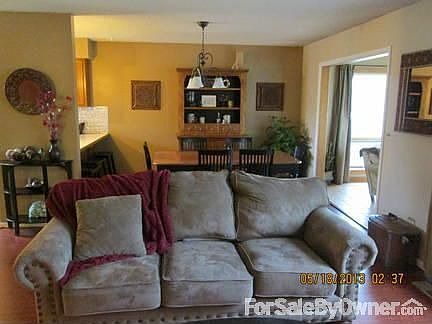 Living Room & Dining Room
						:
						Looking from living room toward dining room and sunroom.