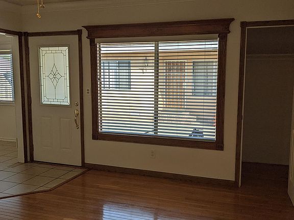 Front entrance, living room & living room walk in closet