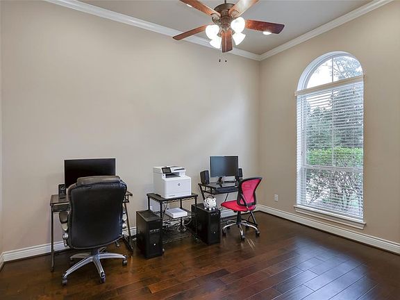 The front office looks out upon the front of the home.
