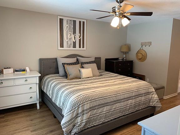 Master bedroom with sliding doors to pool area