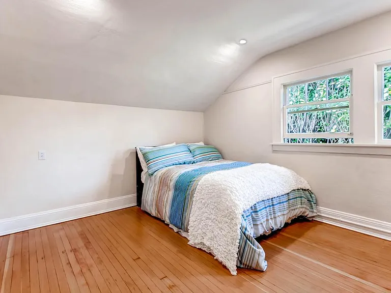 Queen Bed with Queen Trundle Bed that Rolls Out to the Left