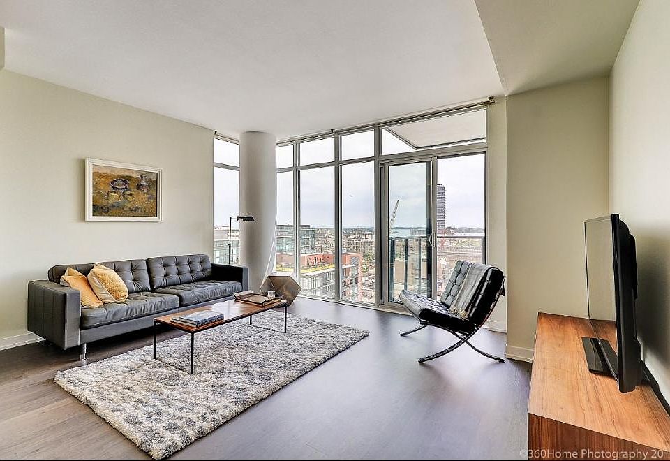 Livingroom with view to lake (electric blinds and TV wall mount added since picture was taken)