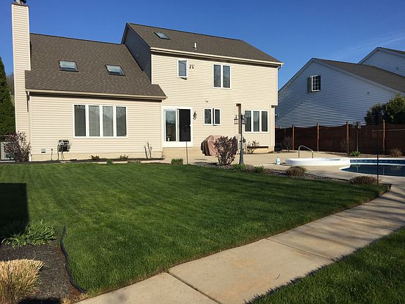 Backyard from poolhouse
