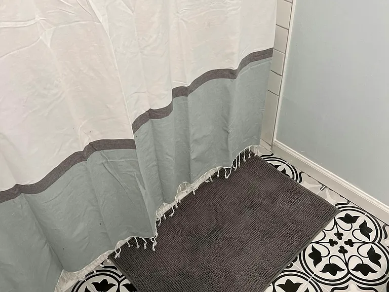 Full shower with tub. Shared with Guest Room 1 (male guest)