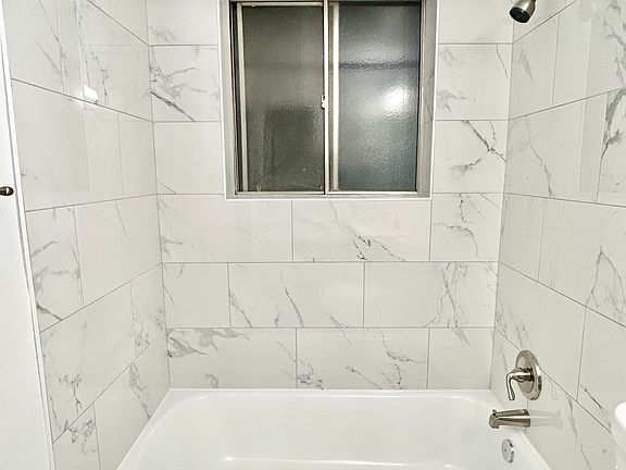 Experience luxury in everyday moments with this stylish marble bathroom. Experience luxury in everyday moments with this stylish marble bathroom.