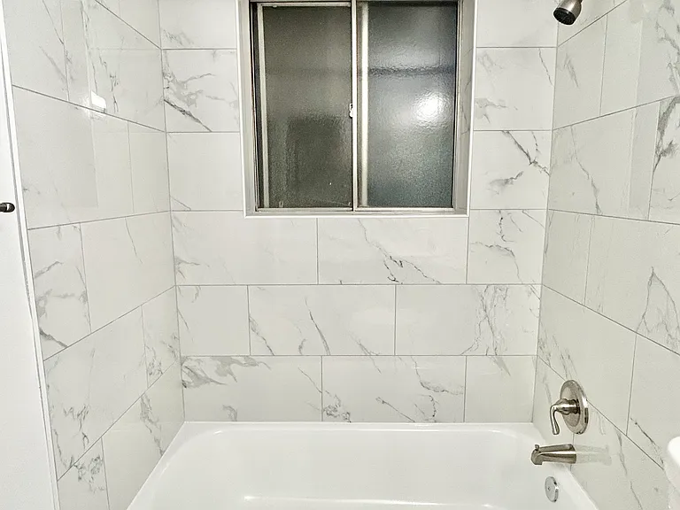 Experience luxury in everyday moments with this stylish marble bathroom. Experience luxury in everyday moments with this stylish marble bathroom.