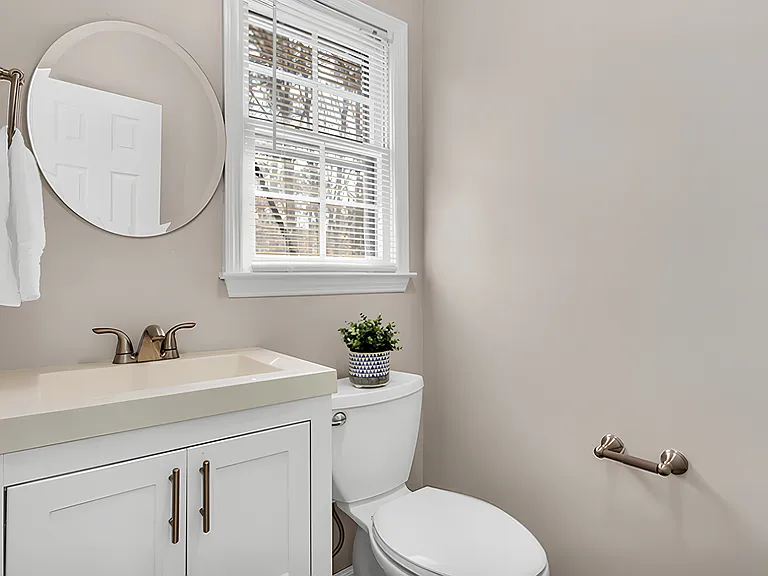 Private half bath for room 2.