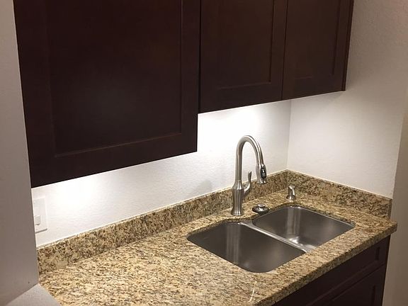 Renovated kitchen with new cabinets, new sink