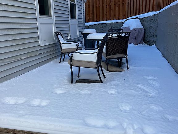 Great little side yard with a patio. Property is rented with a grill, lawn mower and edger