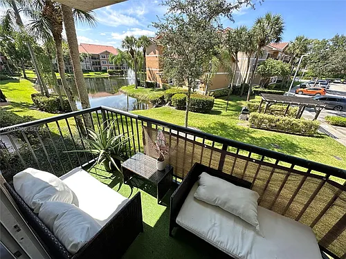 8955 Wiles Rd #208 Photo 1