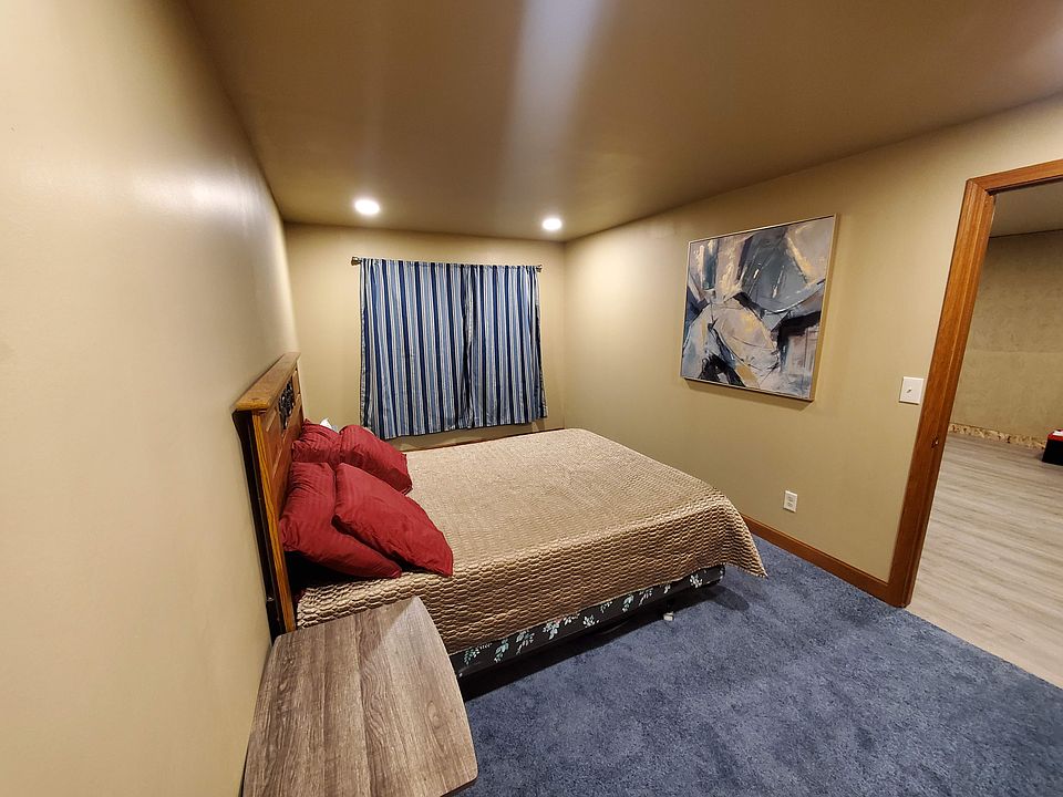 Basement bedroom with queen size bed