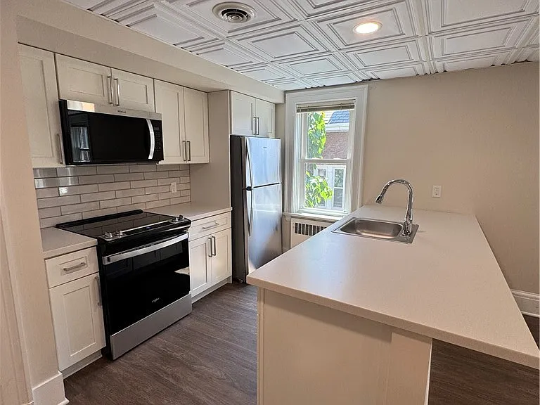 77 W Humboldt Pkwy #B — Photo 6