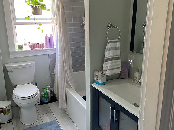 shared bathroom. Soaking tub and shower. Vanity drawer saved for others