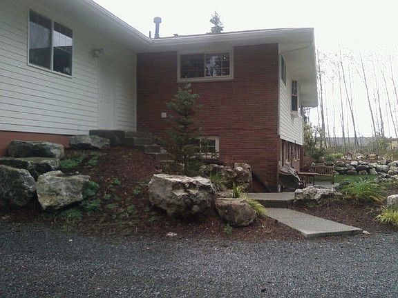 LEFTSIDE OF HOME WITH ATTACHED GARAGE