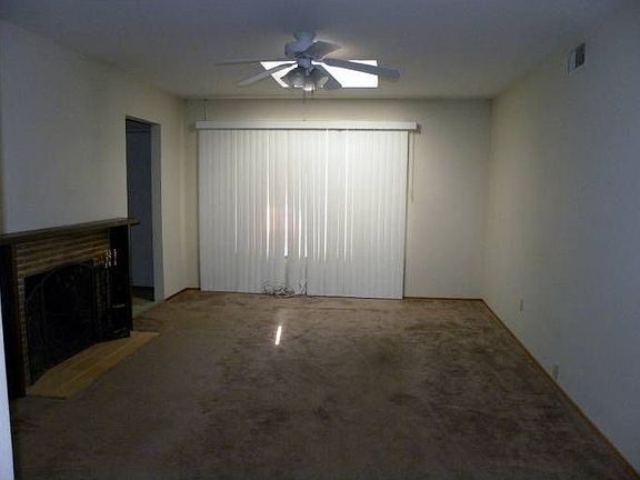 living room with fireplac