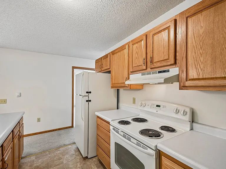 Elevate your culinary experience in the spacious kitchen at Mill Pond Apartments. Featuring modern appliances and ample cabinet space, it's perfect for cooking and entertaining. Don't miss your chance to make this space your ownschedule a tour today!