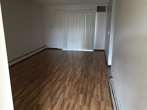 living room has wood grand floors