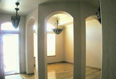 Custom Touches with Archways to the Formal Dining Room