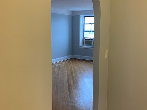 Archway to spacious living room