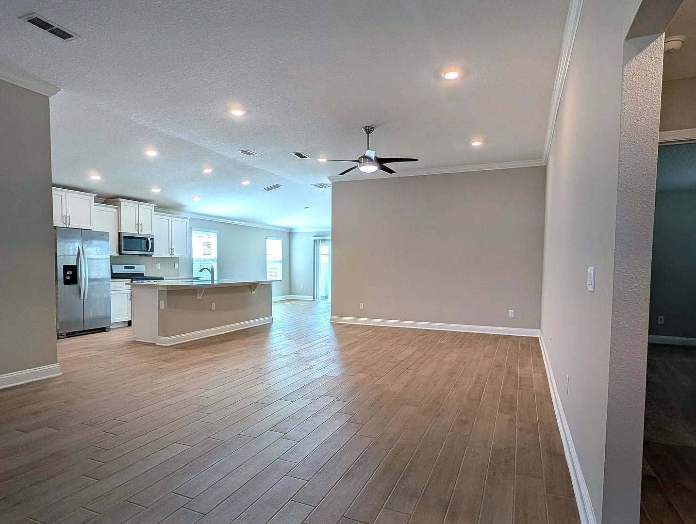 Premium Price, Premium Finishes And Fully Fenced Rear Yard - This 3/2/2 In The Desirable Gated Do... — Photo 4