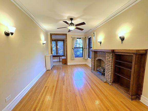 Spacious living room with fireplace & built-in bookcase!