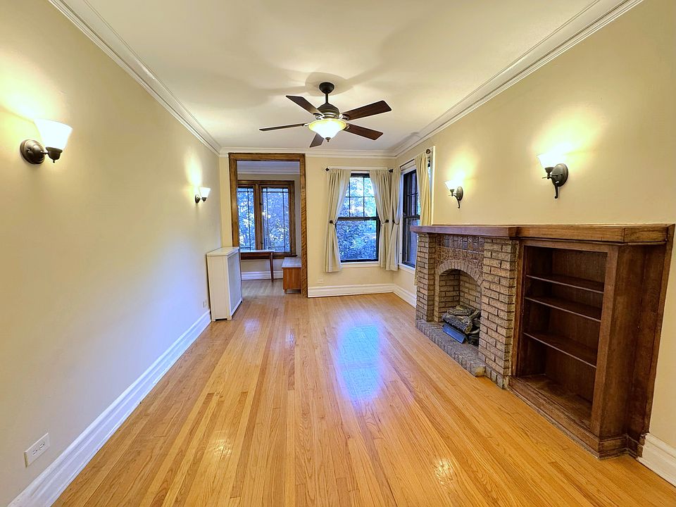 Spacious living room with fireplace & built-in bookcase!