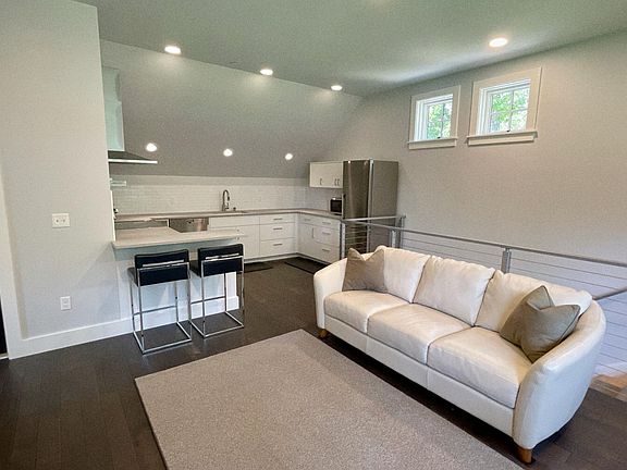 Living room looking towards open kitchen