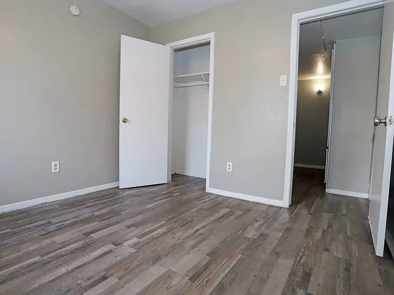 Comfortable secondary bedroom with plenty of closet space.
