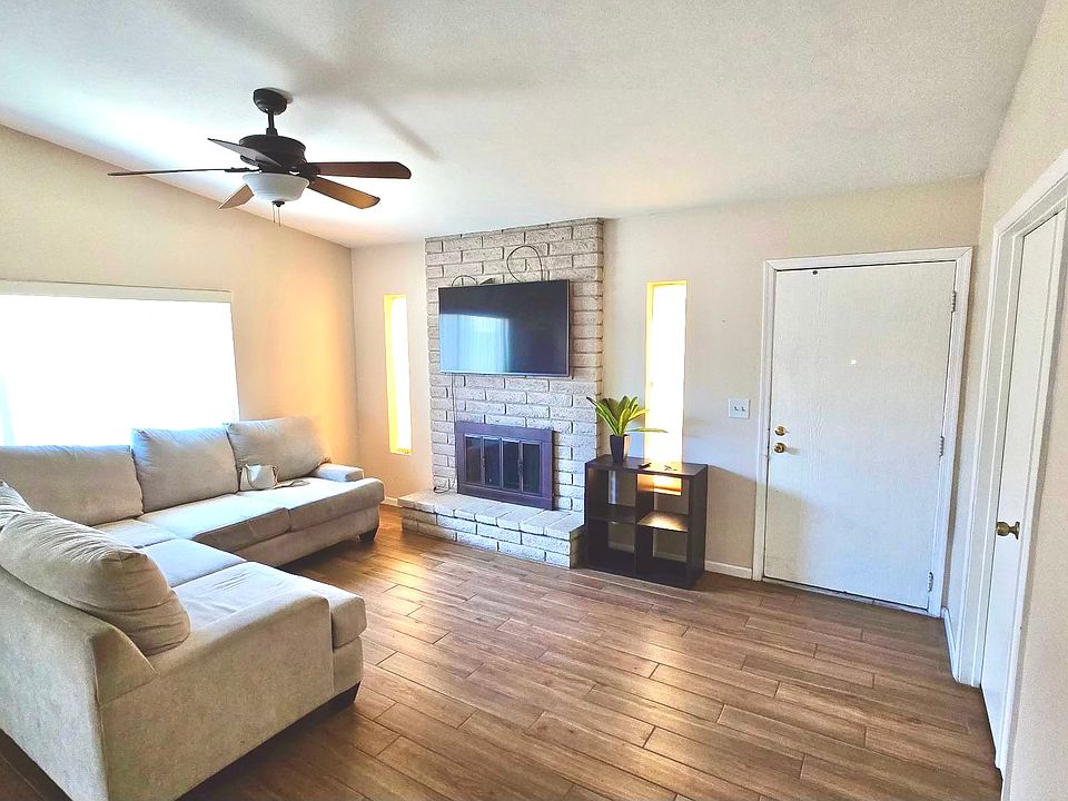 Living room furniture pictured included with rental (optional)