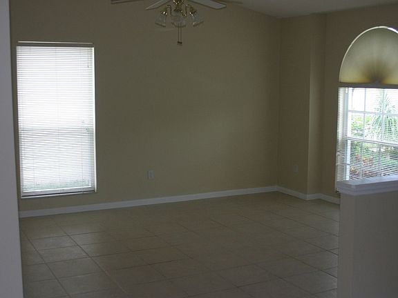 Bright & Welcoming, Formal, Tiled Living Room. 
