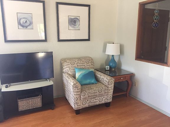 Reading Nook - TV Cart Pulls Out for Use from Couch Area