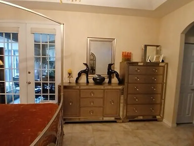 Master Bedrm - Linen closet on rt in foyer with locked door/His and Her closets/Master bath/Toilet Rm with storage/Totally Private