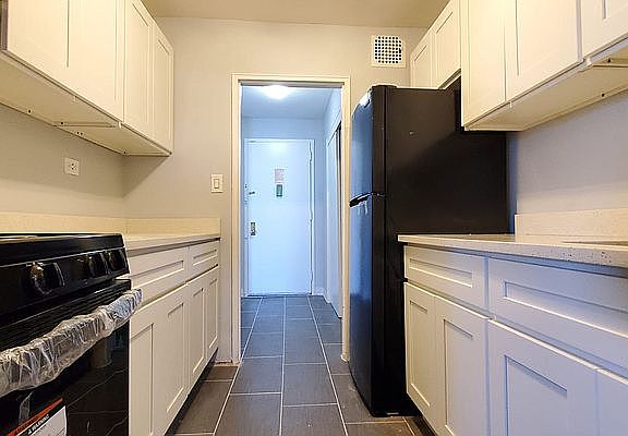 5th image of 6910 Avenue U APT 4J
