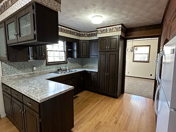 Kitchen with dining room through doorway