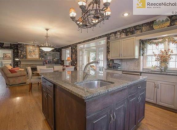 Tons of storage, two sinks, and a double oven make this kitchen a chef's dream.