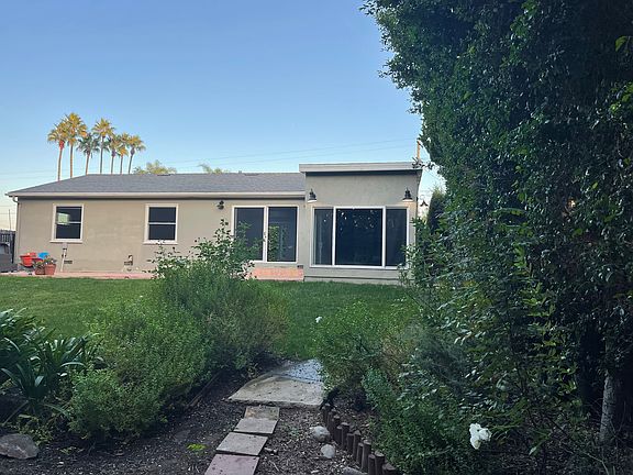 View from the back of the house and backyard