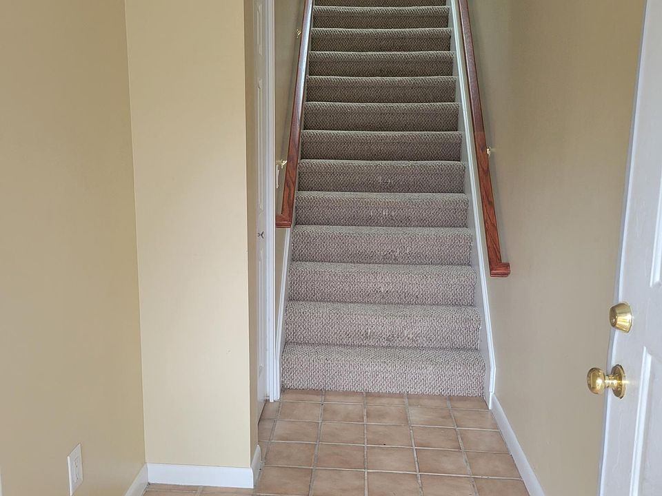 Entry Way (stairs to living area) Large closet on right.