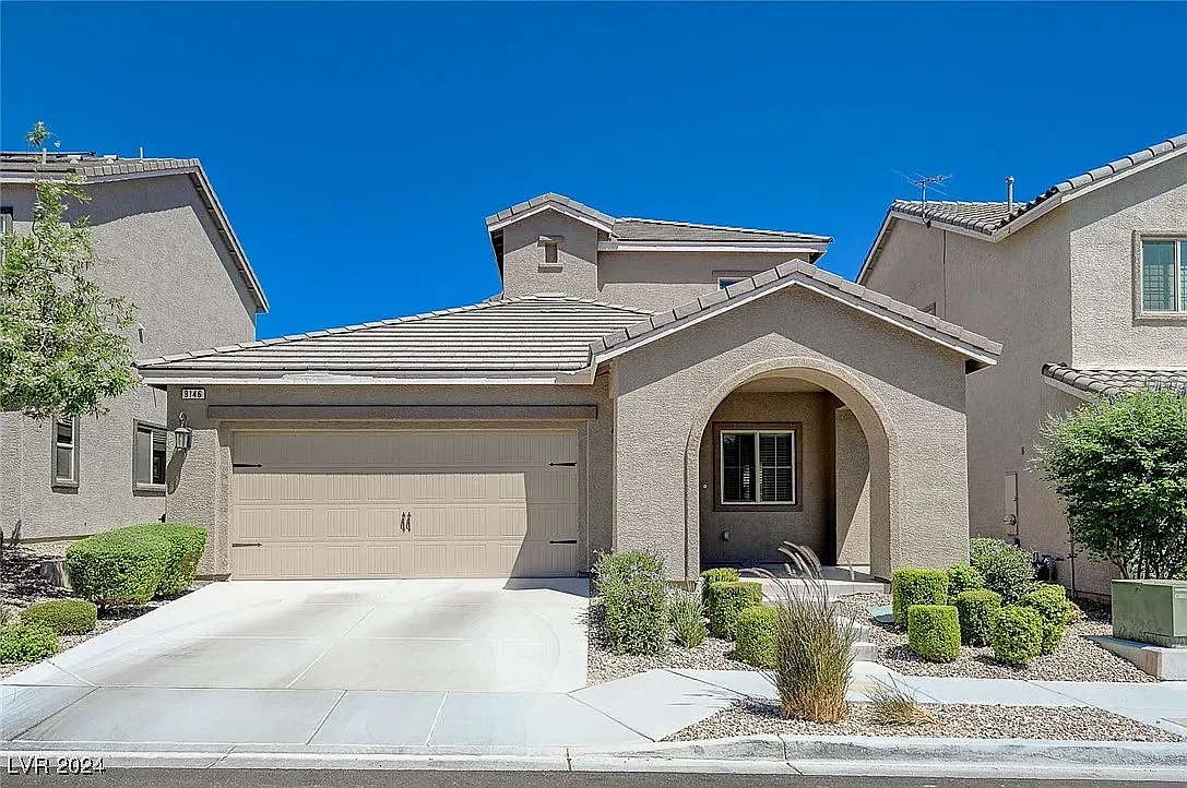 9146 Laughing Owl Ave — Photo 1