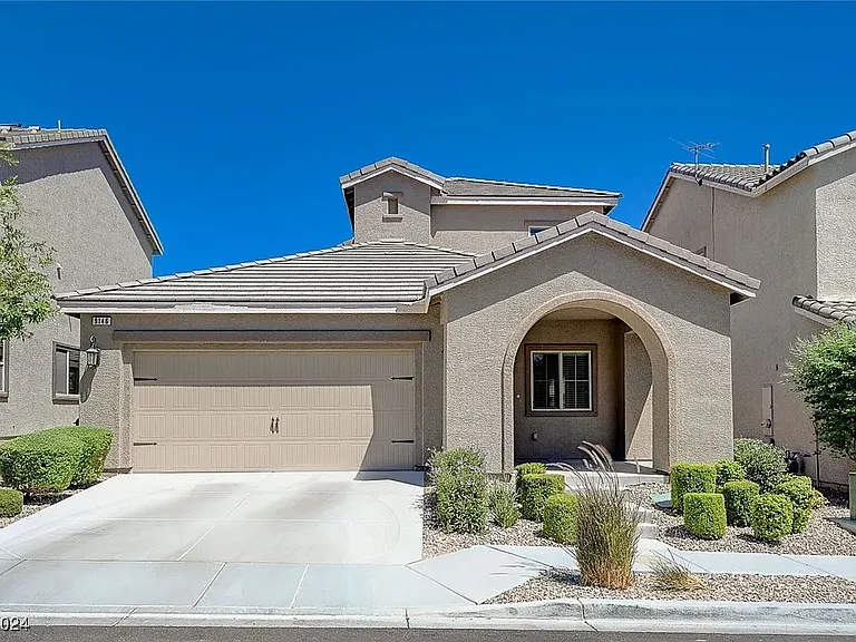 9146 Laughing Owl Ave — Photo 1
