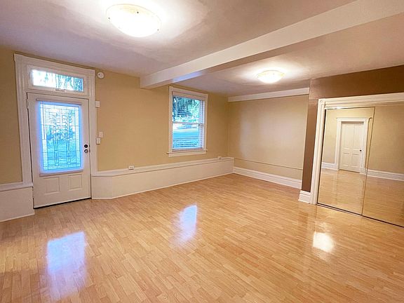 Maple Flooring, Mirrored-Slider on Large Closet, Leaded-Glass in Front Door, Double-Hung Insulated Windows, Awning Transom Window.