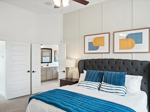 Primary suite with sloped ceiling