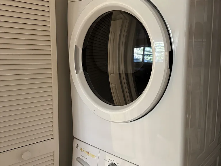 Inside washer/dryer for easy access.